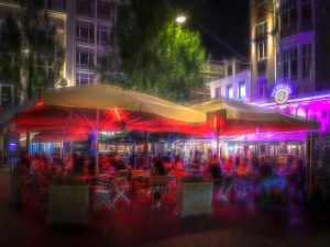 Painterly nightlife scene at Leidseplein, Amsterdam, Netherlands