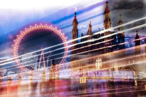 A photo composite of the monuments London Eye and Houses of Parliament in a painterly way, London, Great Britain,